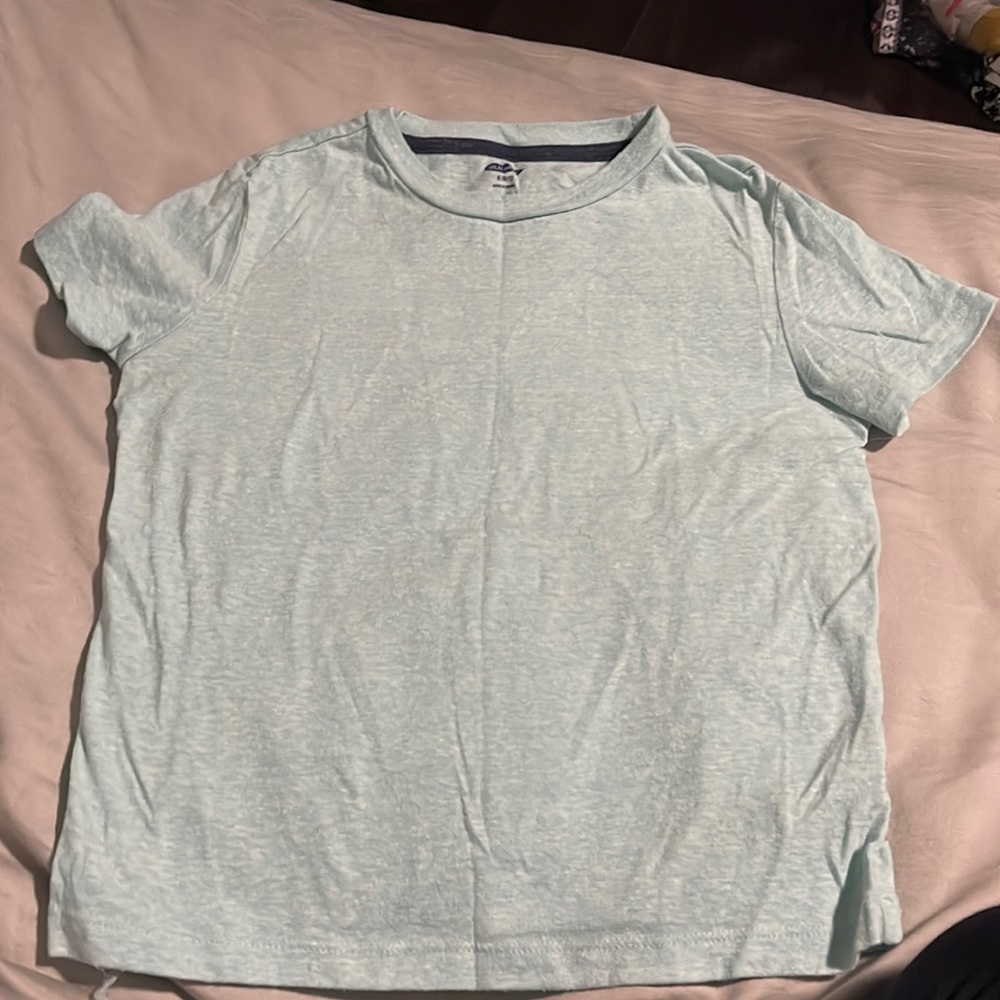A light blue old navy shirt, in size small 6-7